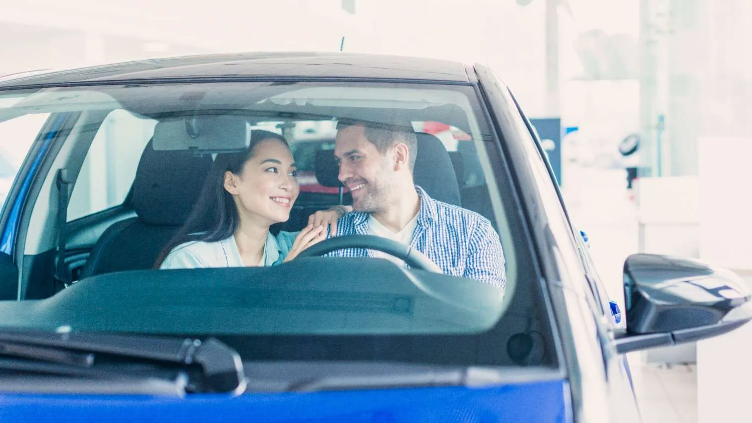 Reviewing an auto insurance policy at a desk