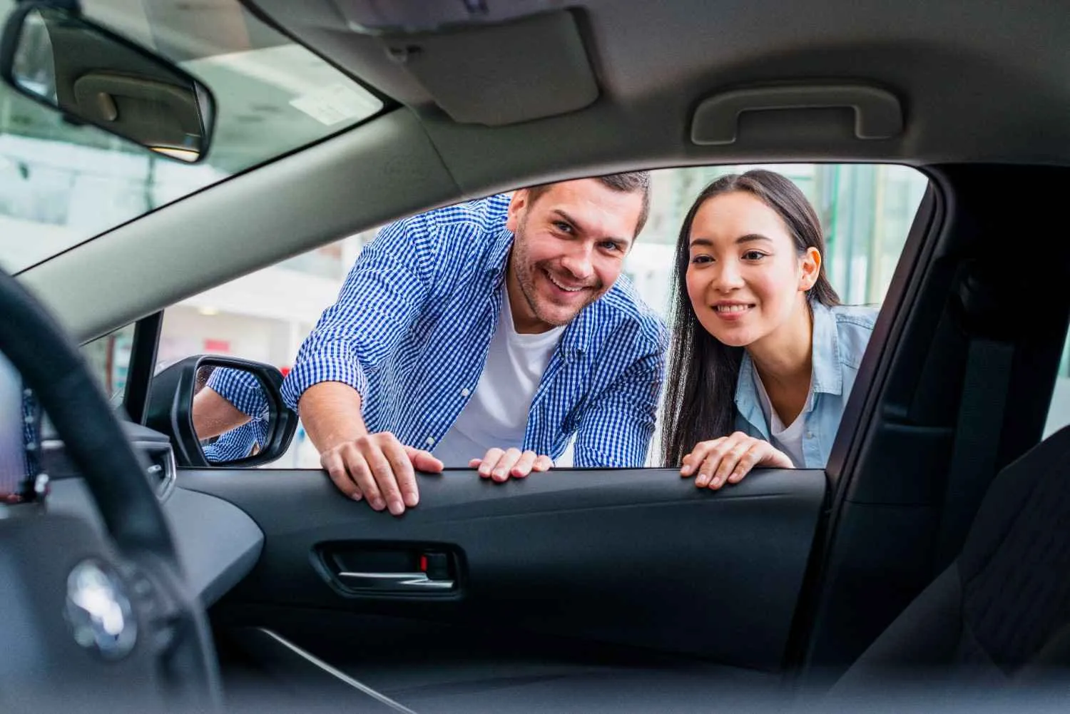 Reviewing auto insurance coverage choices at a desk